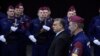 Hungarian Prime Minister Viktor Orban, 2nd right, arrives for a swearing-in ceremony for a new group of border guards known locally as “border hunters,” in Budapest, Hungary, March 7, 2017.