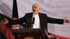 Afghan president-elect Ashraf Ghani Ahmadzai speaks in his first public appearance since being declared winner in the election runoff, in Kabul, Sept. 22, 2014.