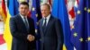  Ukrainian Prime Minister Volodymyr Groysman is welcomed by European Council President Donald Tusk in Brussels, Belgium, May 24, 2018.