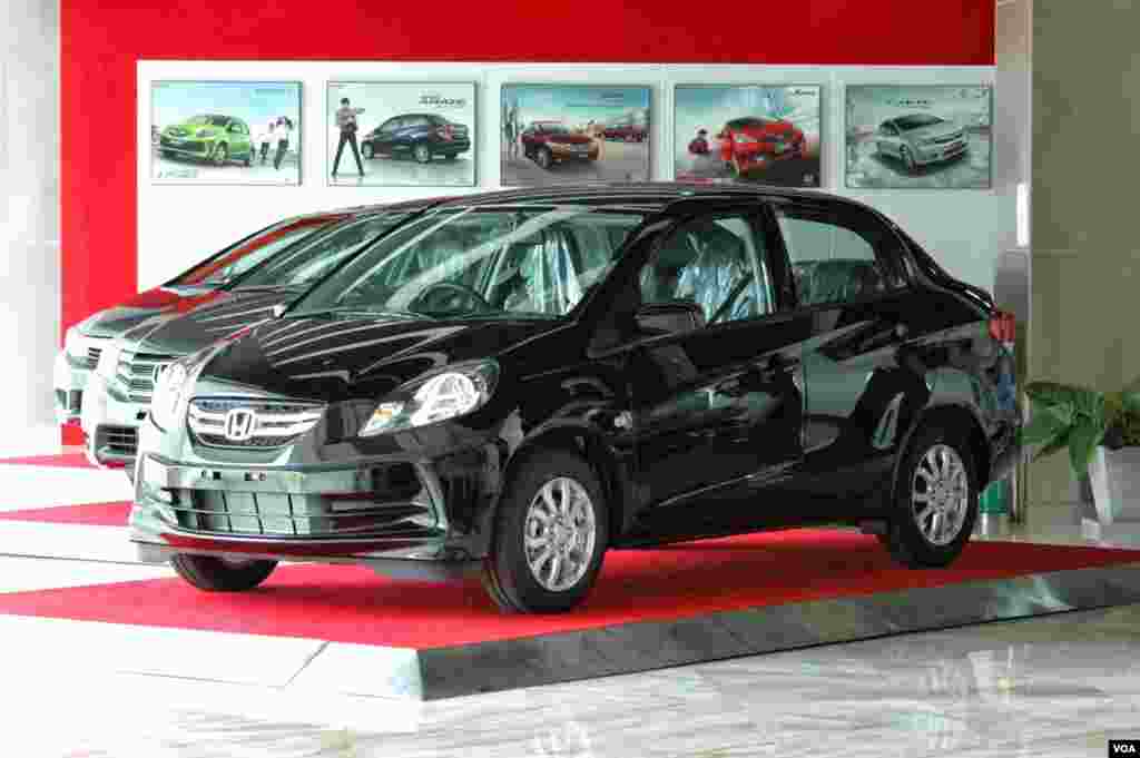 Automakers say while they strive to make cars in Thailand which meet global standards the vehicle designs need to be modified to meet the criteria of Southeast Asian roads and driving habits. (Steve L. Herman/VOA) 